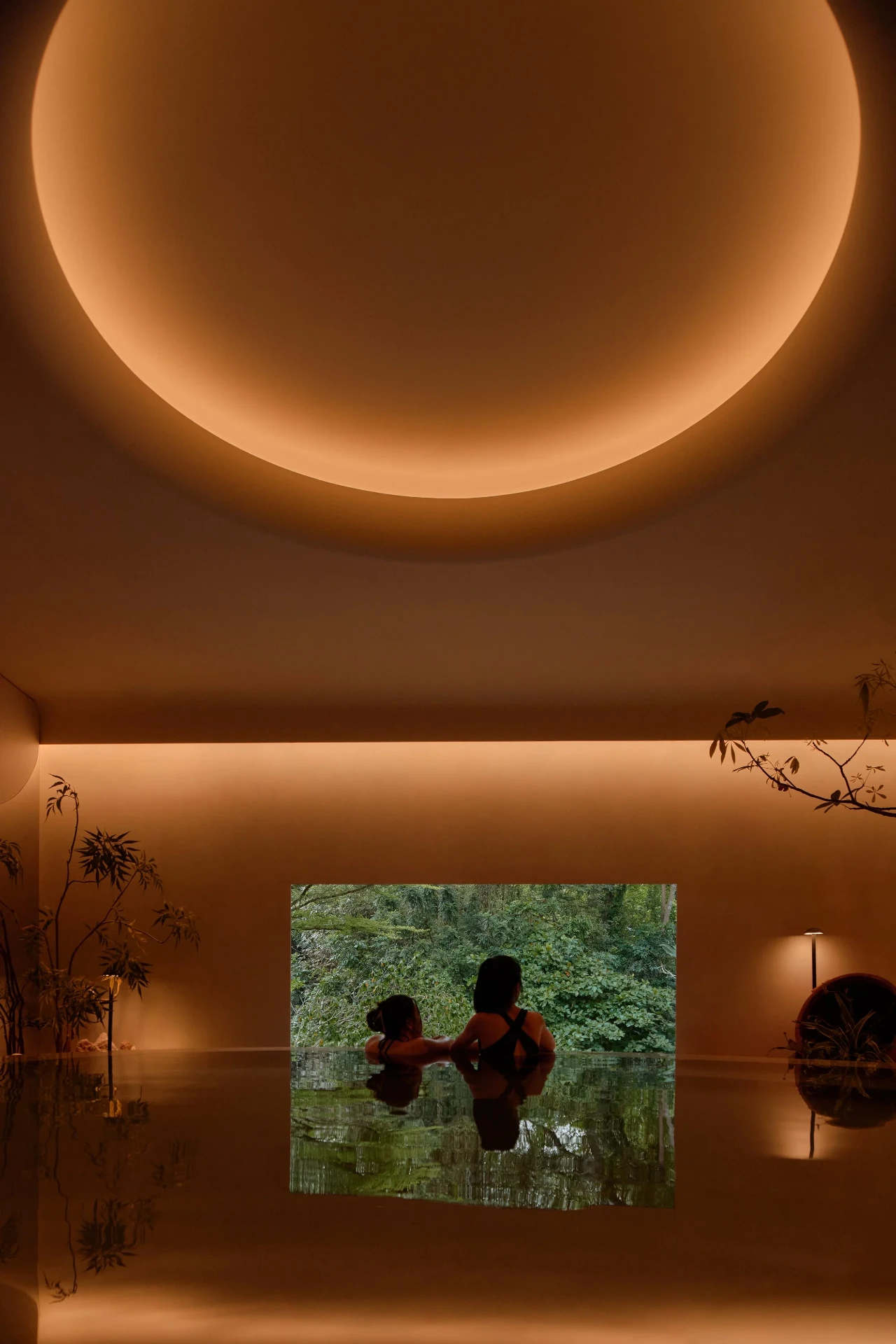 Bathing room at Nowhere Baths looking out into the Dempsey greenery