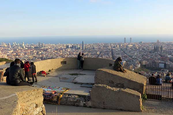 Concrete remains of the former anti-aircraft battery at the Bunkers del Carmel, with Barcelona spread below